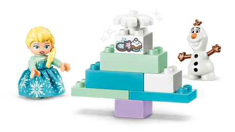 LEGO DUPLO Elsa and Olaf beside a stepped Frozen cake build with snowflake detail