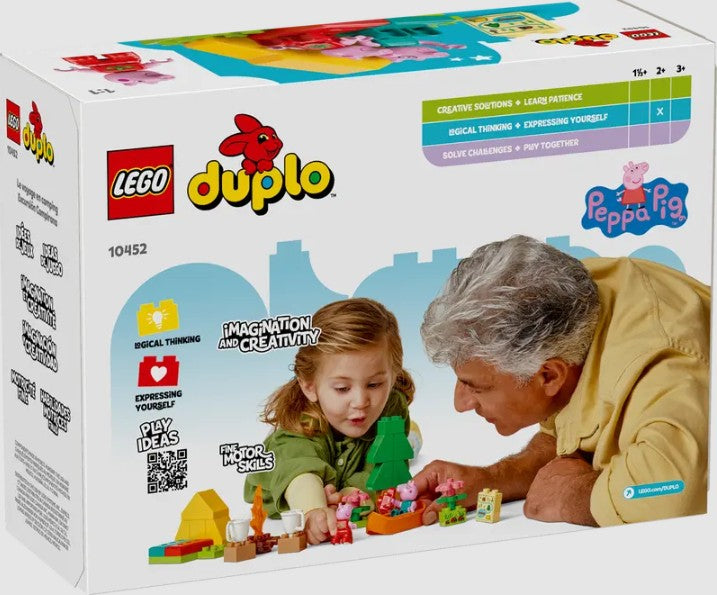 Child and adult playing with LEGO DUPLO Peppa Pig Camping Trip set 10452