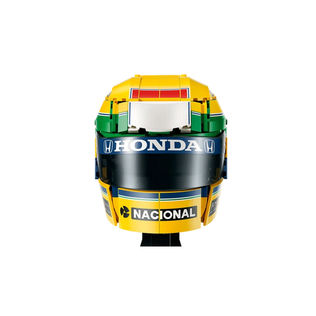 Front close-up of LEGO Ayrton Senna Helmet 43024 showing yellow, green and blue racing colours and sponsor logos