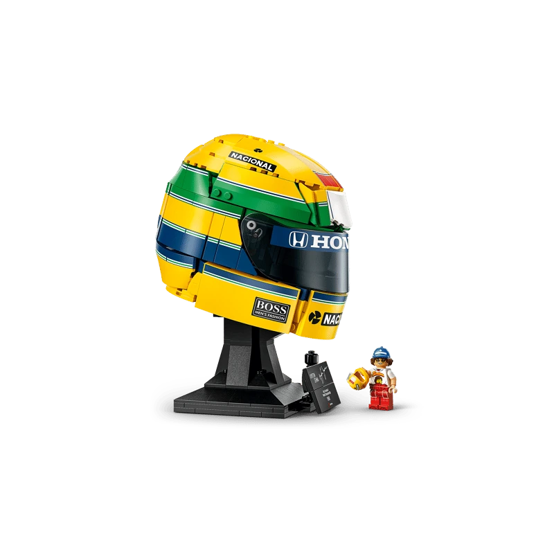 Three-quarter view of LEGO Ayrton Senna Helmet 43024 with Senna minifigure, mini helmet and signature plaque