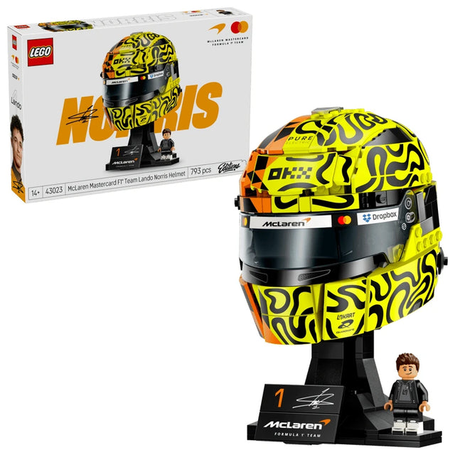 LEGO Editions Lando Norris Helmet retail box beside the completed helmet model, black McLaren display base and minifigure