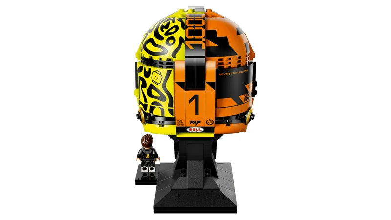 Rear view of the LEGO Lando Norris Helmet showing the split fluorescent yellow, black and orange design, number 1 detail and black display stand