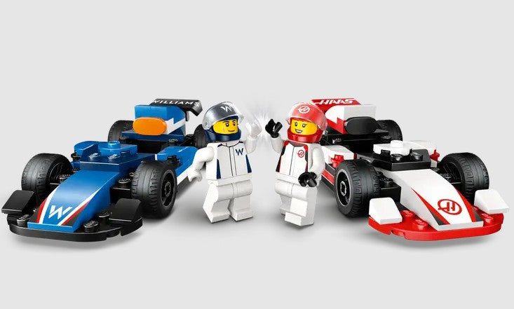 LEGO F1 Williams and Haas drivers high-fiving Ireland