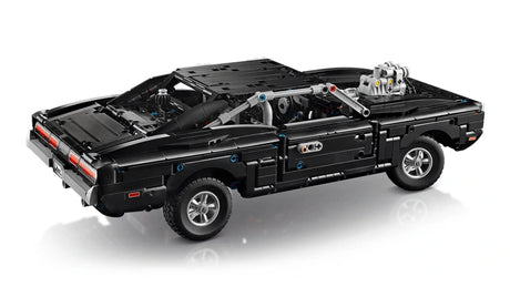 Rear side view of LEGO Technic Dodge Charger R/T car with black bodywork and silver engine detail