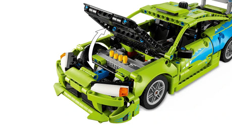 Rear side view of LEGO Technic Mitsubishi Eclipse car with black rear wing and red rear panel