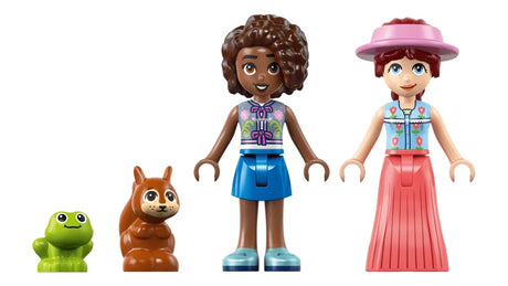 Two LEGO Friends mini-dolls with frog, squirrel and snail figures