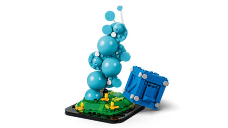 LEGO Fortnite supply drop base with blue smoke column and open blue crate