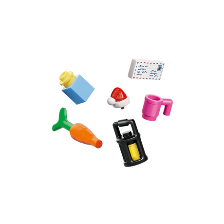 LEGO accessories including a carrot, lantern, pink mug, Santa hat, envelope and blue and yellow brick
