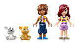 LEGO Friends Heartlake City Bunny Hotel 42679 two LEGO Friends minidolls standing side by side, with two bunny figures displayed separately to the left