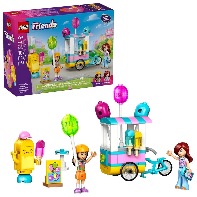 LEGO Friends Ice Cream & Balloon Stand product image showing retail box beside built cart, Liann, Paisley, ice pop mascot, bicycle, balloons and accessories