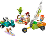 LEGO Friends Surfing Dogs and Scooter Adventure set with beach scene, scooter, land yacht and characters on a white background
