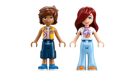 LEGO Friends Unicorn Cake Delivery Car 42675 Paisley and Leo minidolls shown front facing, Paisley with long red hair wearing a unicorn print top and blue trousers, Leo with short brown hair wearing a patterned vest and blue shorts