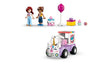 LEGO Friends Unicorn Cake Delivery Car 42675 unicorn themed car with pastel colours shown beside Paisley and Leo minidolls
