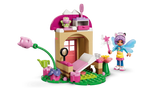 Open LEGO Gabby's Dollhouse Kitty Fairy's Garden House 11212 showing the interior, bed, Gabby and Kitty Fairy