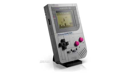 LEGO Nintendo Game Boy model on black display stand with an angled front view and a platform game scene shown on the screen