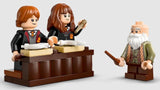 LEGO Harry Potter Ron, Hermione, and Professor Flitwick minifigures with classroom desk