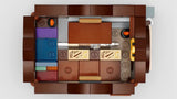 Top view of LEGO Charms Class 76442 showing packed spell accessories and layout