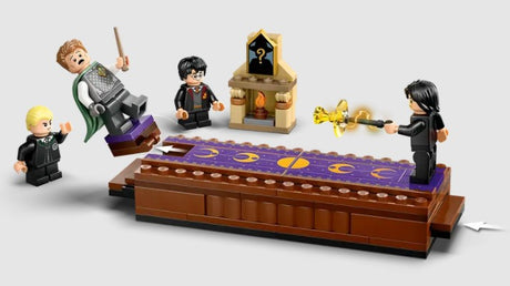 Minifigures toppled during wizard duel using the battle feature.