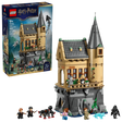 LEGO Harry Potter Hogwarts Castle Hospital Wing 76463 box shown beside the assembled tan tower build on a grey rocky base with minifigures, black spider and blue wolf figure