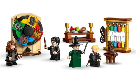 Assembled LEGO Hogwarts Sorting Hat Ceremony scene with spinning house wheel, Professor McGonagall, Harry Potter, Hermione Granger and Draco Malfoy minifigures, table and house points counter
