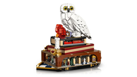 LEGO Harry Potter angled display model with Hedwig on stacked books above the trunk base