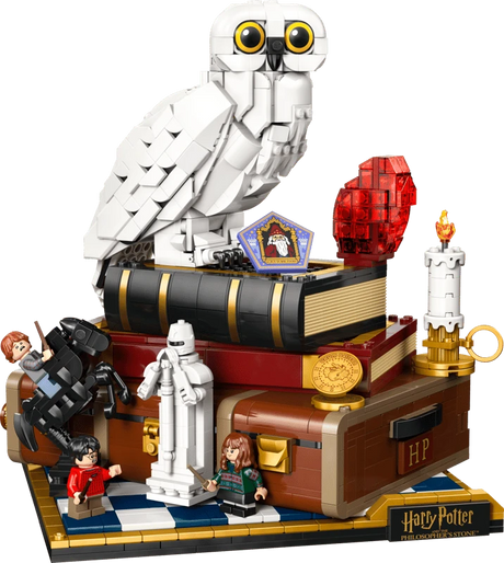 LEGO Harry Potter display model with Hedwig, red stone, chess pieces, minifigures and trunk base