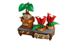 LEGO plant display table with potted Mandrake, red flowers, drawer and earmuffs accessory