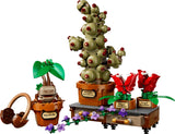 LEGO Harry Potter plant display with three potted plants, brown table, drawer, earmuffs and small flower accessories