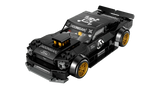 Angled front view of LEGO black Hoonicorn car model with gold wheels and bonnet detail