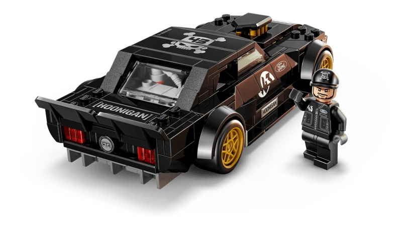 Rear angle view of LEGO black Hoonicorn car model with gold wheels and driver minifigure