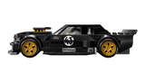 Side view of LEGO black Hoonicorn car model with gold wheels and side graphics