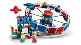 LEGO UFO ride build with ticket booth, minifigures and red and blue ride details