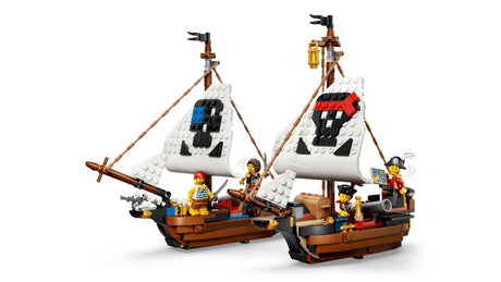 Two small LEGO pirate ships with white sails, pirate minifigures and cannons