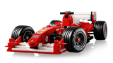 LEGO Icons Ferrari F2004 completed model close-up showing red bodywork, Bridgestone Potenza tyres and white rear wing