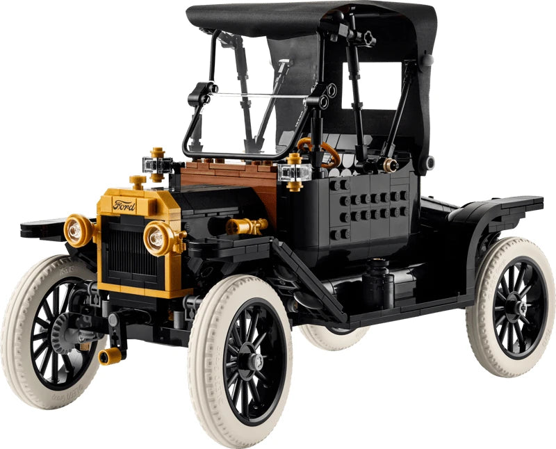 LEGO Icons Ford Model T in three quarter front view with black bodywork, gold front details, white tyres and a raised black fabric roof