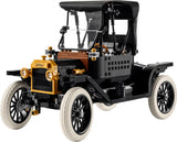 LEGO Icons Ford Model T in three quarter front view with black bodywork, gold front details, white tyres and a raised black fabric roof