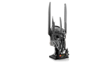 Angled side view of LEGO Icons Sauron’s Helmet model on black display stand with Sauron minifigure holding a gold ring