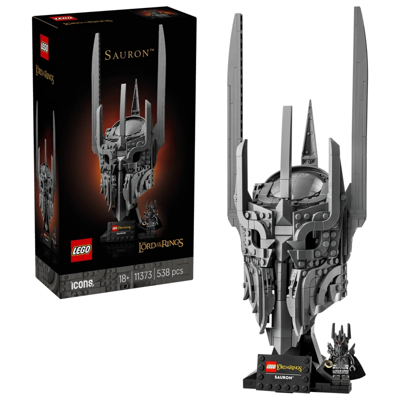 LEGO Icons The Lord of the Rings Sauron’s Helmet 11373 retail box beside built helmet model on black stand with Sauron minifigure and name plaque