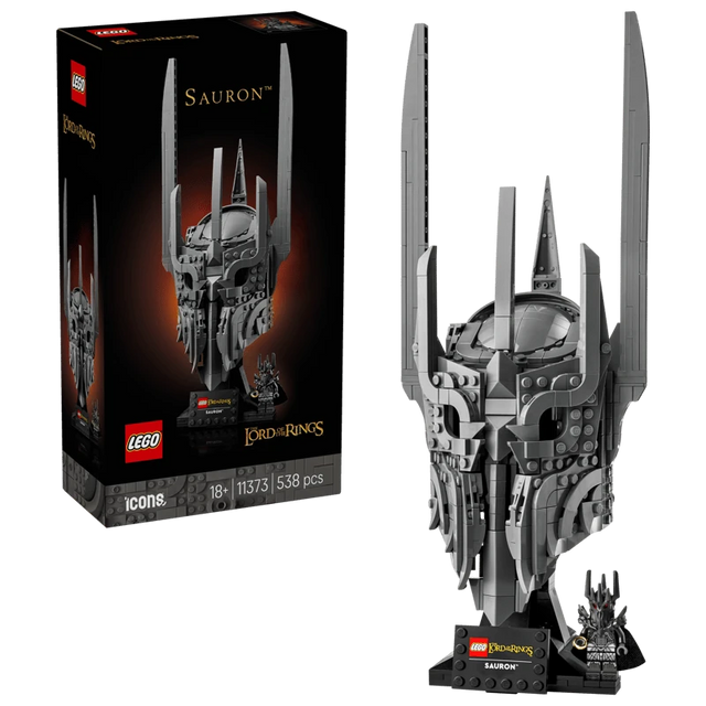 LEGO Icons The Lord of the Rings Sauron’s Helmet 11373 retail box beside built helmet model on black stand with Sauron minifigure and name plaque