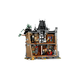 Open back view of LEGO Icons Mayor Manor 11383 showing two furnished floors and three minifigures