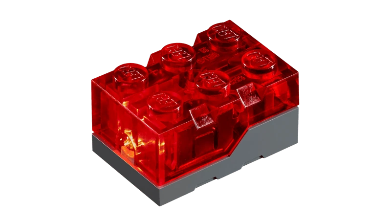 Red LEGO light brick included with the LEGO Ideas E.T. the Extra-Terrestrial 21370 set