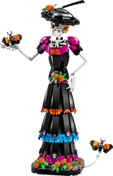 Completed LEGO Ideas La Catrina 21372 display figure with a decorated hat, floral dress and orange butterflies
