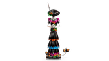 Front view of the LEGO Ideas La Catrina 21372 figure with hands clasped and butterflies beside the floral base