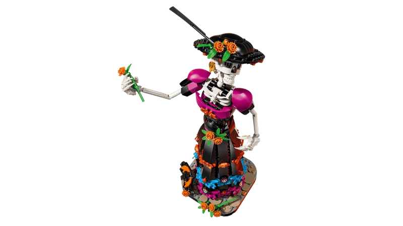 High angle view of the LEGO Ideas La Catrina 21372 figure holding an orange flower