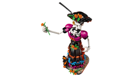High angle view of the LEGO Ideas La Catrina 21372 figure holding an orange flower