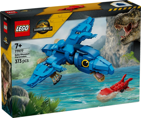 Front of the LEGO Jurassic World Baby Dinosaur: Pteranodon 77977 box showing the blue Pteranodon flying above the water and the red squid