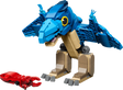 Completed LEGO Jurassic World Baby Dinosaur: Pteranodon 77977 model standing beside the red squid 