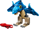 Completed LEGO Jurassic World Baby Dinosaur: Pteranodon 77977 model standing beside the red squid 