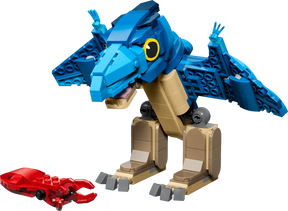 Completed LEGO Jurassic World Baby Dinosaur: Pteranodon 77977 model standing beside the red squid 