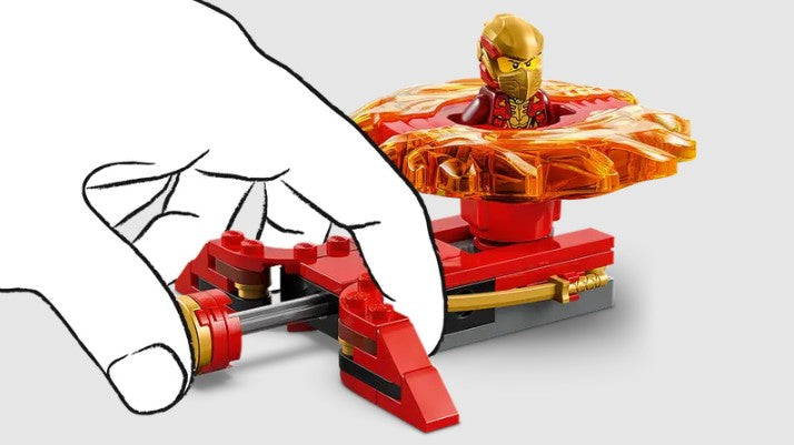 LEGO 71823 close-up of launcher being pushed to spin Kai – Ireland